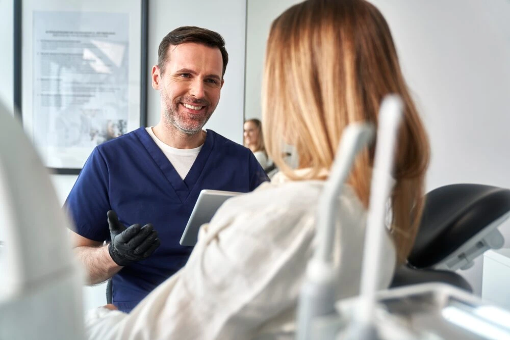 Consultation,Of,The,Dentist,And,The,Patient,In,The,Cabinet Dental cleaning near me